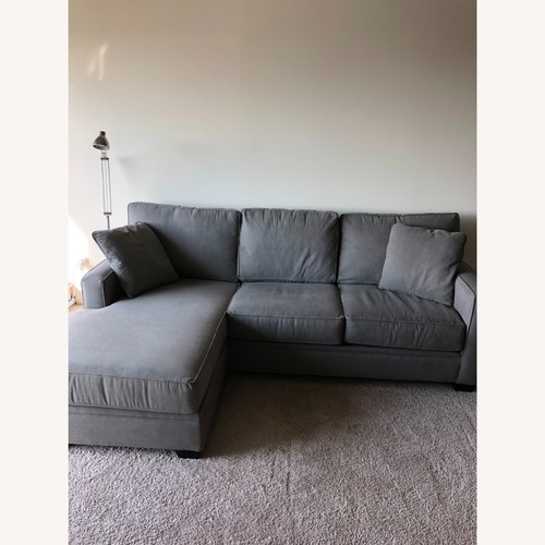 Used Roy's Furniture Dark Gray 2 Piece Sectional for sale on AptDeco
