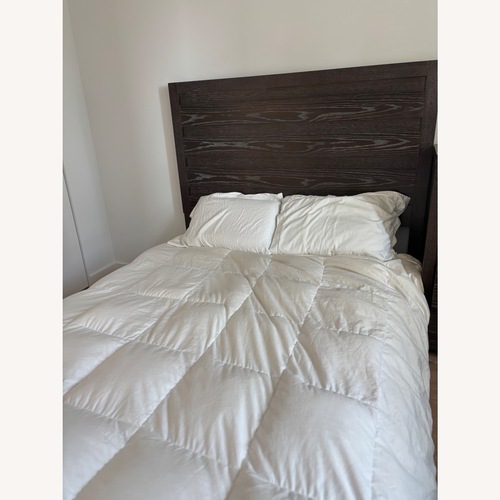 Used Dark Brown Wood Queen Bed Frame  for sale on AptDeco