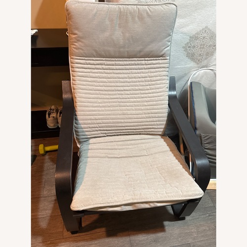 Used IKEA Black Wood Armchair for sale on AptDeco