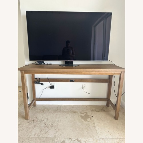 Used City Furniture Light Brown Wood Veneer Play Table for sale on AptDeco