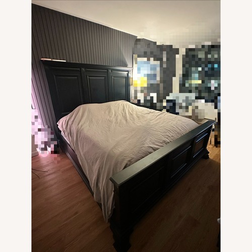 Used Vintage/Antique Black Wood King Bed for sale on AptDeco