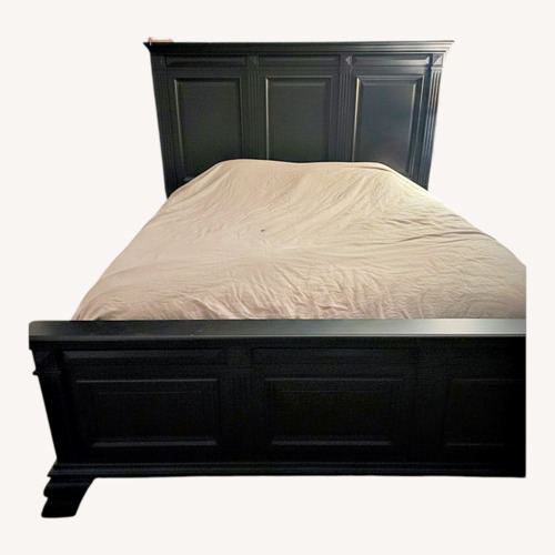 Used Vintage/Antique Black Wood King Bed for sale on AptDeco
