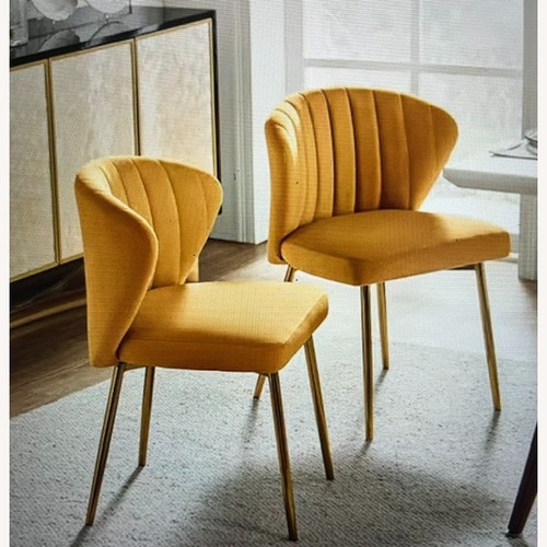 Used Milia Golden Legs Mustard Tufted Dining Chairs for sale on AptDeco