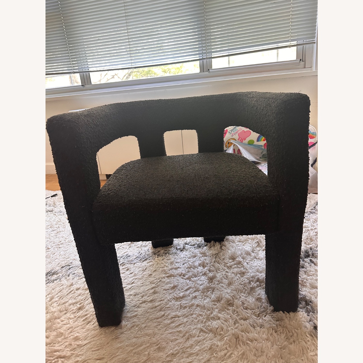 CB2 Stature Black Boucle Dining Armchair - image-1