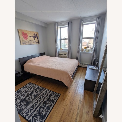 Used Modern Espresso Wood Queen Platform Bed Frame for sale on AptDeco