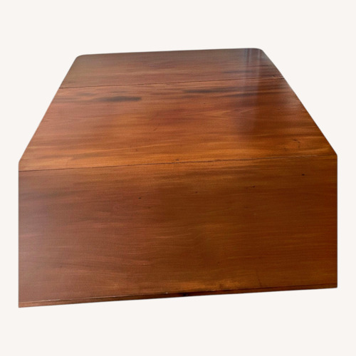 Used Vintage/Antique Dark Brown Dining Table for sale on AptDeco