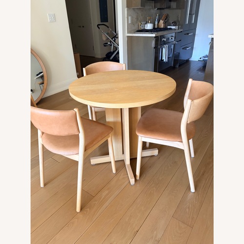 Used West Elm Wood Bistro Table & Leather Dining Chairs for sale on AptDeco