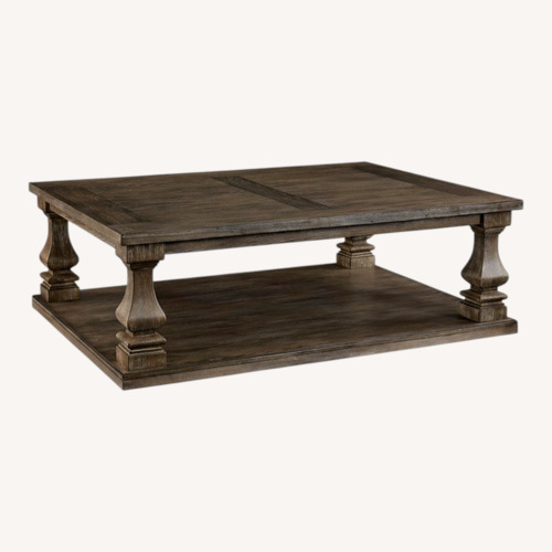 Used Ashley Furniture Light Brown Wood Coffee Table for sale on AptDeco