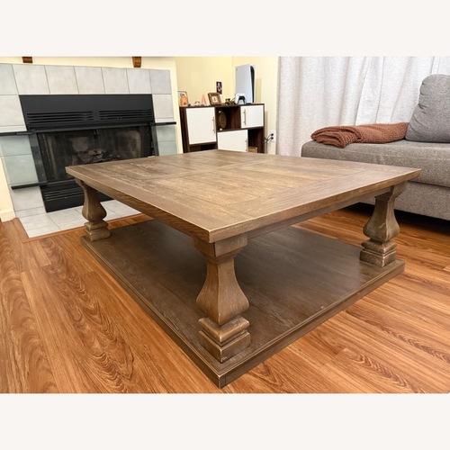 Used Ashley Furniture Light Brown Wood Coffee Table for sale on AptDeco