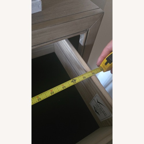 Used Ashley Furniture Arnett Modern 5-Drawer Chest for sale on AptDeco