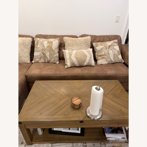 Used Bob's Discount Furniture Sonoma Natural Lift-Top Storage Coffee Table for sale on AptDeco