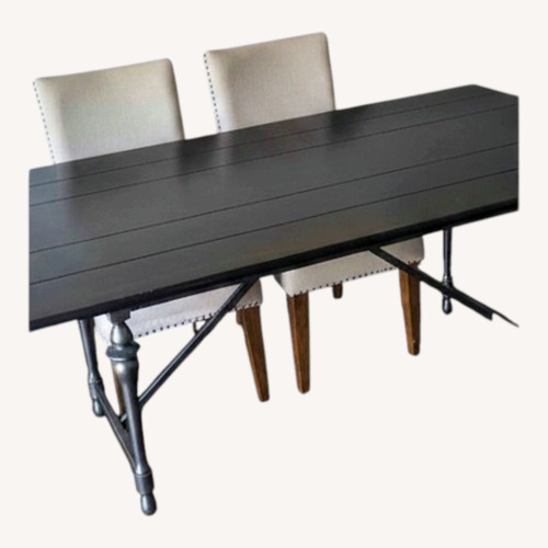 Used True Value Dark Brown Wood Dining Table for sale on AptDeco