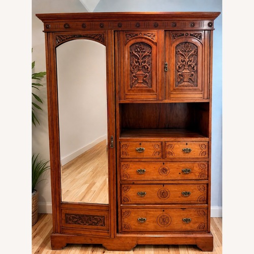 Used Hand Carved Antique Breakdown Armoire w Mirror for sale on AptDeco