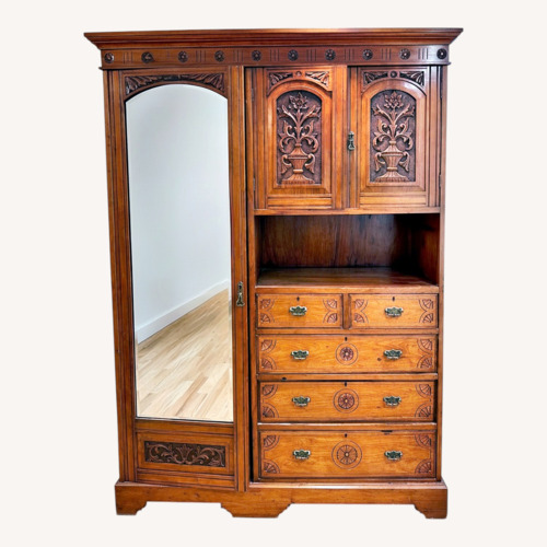 Used Hand Carved Antique Breakdown Armoire w Mirror for sale on AptDeco