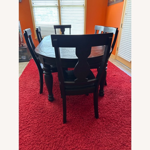 Used Dark Brown Dining Table for sale on AptDeco
