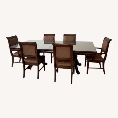 Used Dark Brown Wood Dining Sets for sale on AptDeco