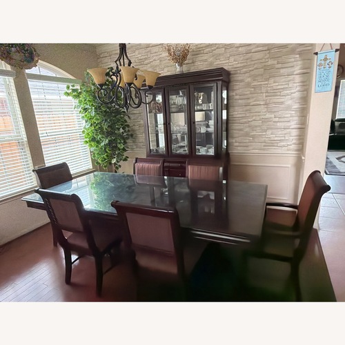 Used Dark Brown Wood Dining Sets for sale on AptDeco