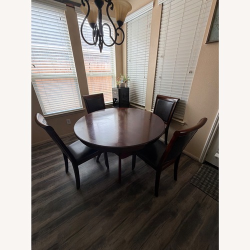 Used Dark Brown Wood Kitchen Island for sale on AptDeco