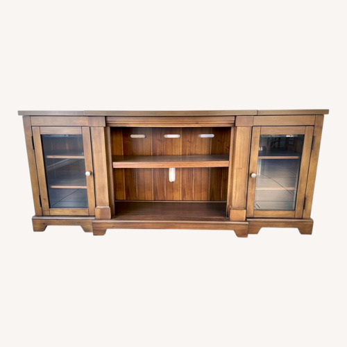 Used Ashley Furniture Light Brown Wood Media Storage for sale on AptDeco