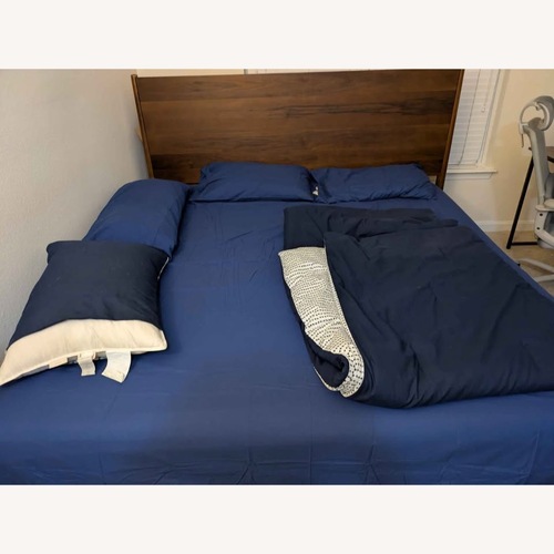 Used Bob's Discount Furniture Bettie Dark Brown Wood King Bed for sale on AptDeco