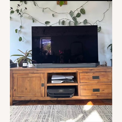 Used Macy's Champagne Media Storage Acacia Wood for sale on AptDeco