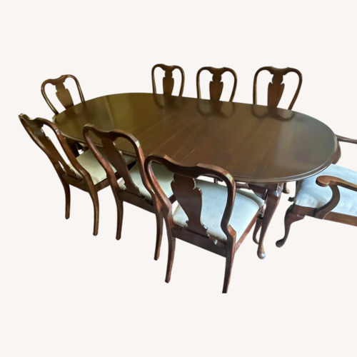 Used Crescent Dining Table (8 Chairs and 2 Leaves) for sale on AptDeco