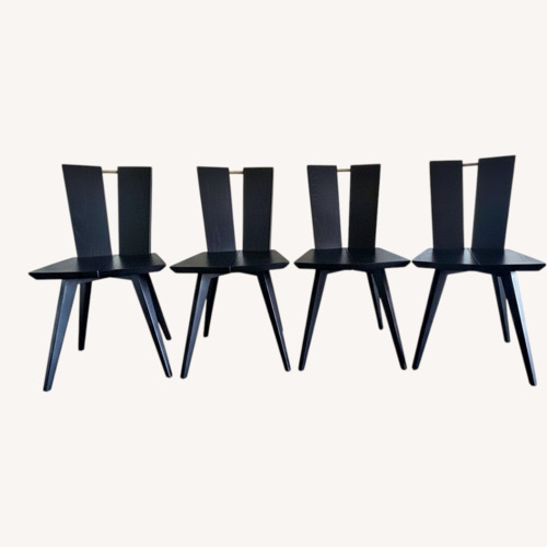 Used Hand-sculpted Dark Brown Wood Dining Chairs for sale on AptDeco