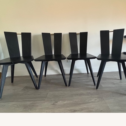 Used Hand-sculpted Dark Brown Wood Dining Chairs for sale on AptDeco
