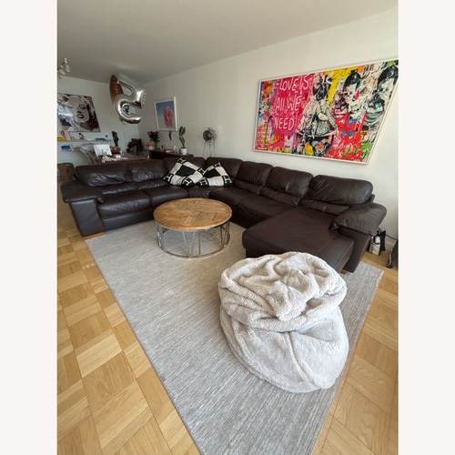 Used Raymour & Flanigan Dark Brown 3+ Piece Sectional for sale on AptDeco