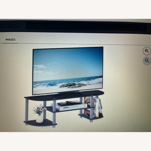 Used Amazon Black Wood Coffee Table for sale on AptDeco