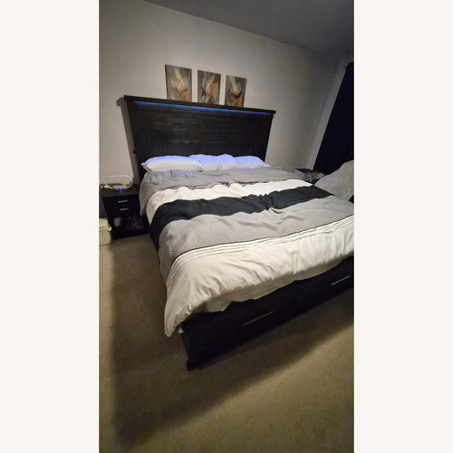 Used Bob's Infinity Dark Brown Wood King Bed for sale on AptDeco