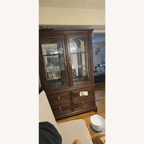 Used Bob's Discount Furniture Dark Brown Armoire for sale on AptDeco