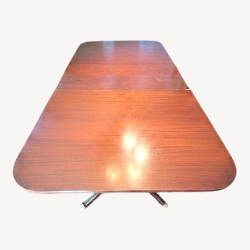 Used Vintage/Antique Dark Brown Wood Dining Table for sale on AptDeco
