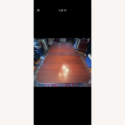 Used Vintage/Antique Dark Brown Wood Dining Table for sale on AptDeco