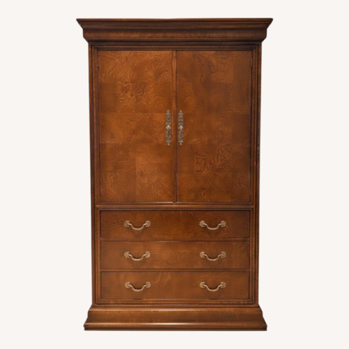 Used Dark Brown Wood Armoire for sale on AptDeco
