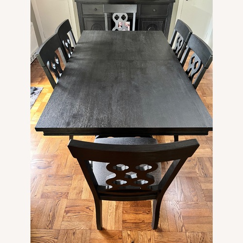 Used Raymour & Flanigan Belmore 8 Piece Dining Set for sale on AptDeco