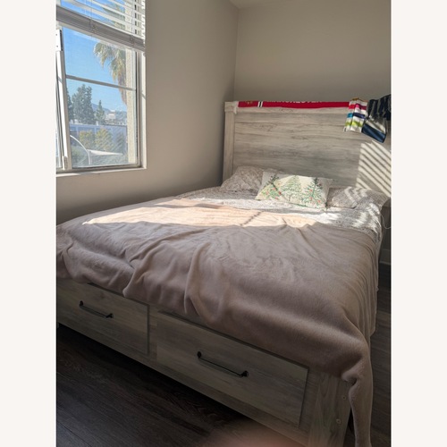 Used Ashley Furniture Bellaby Queen Platform Bed W Storage for sale on AptDeco
