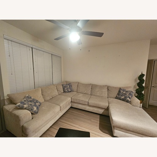Used Rooms To Go Natural Fabric 3+ Piece Sectional for sale on AptDeco