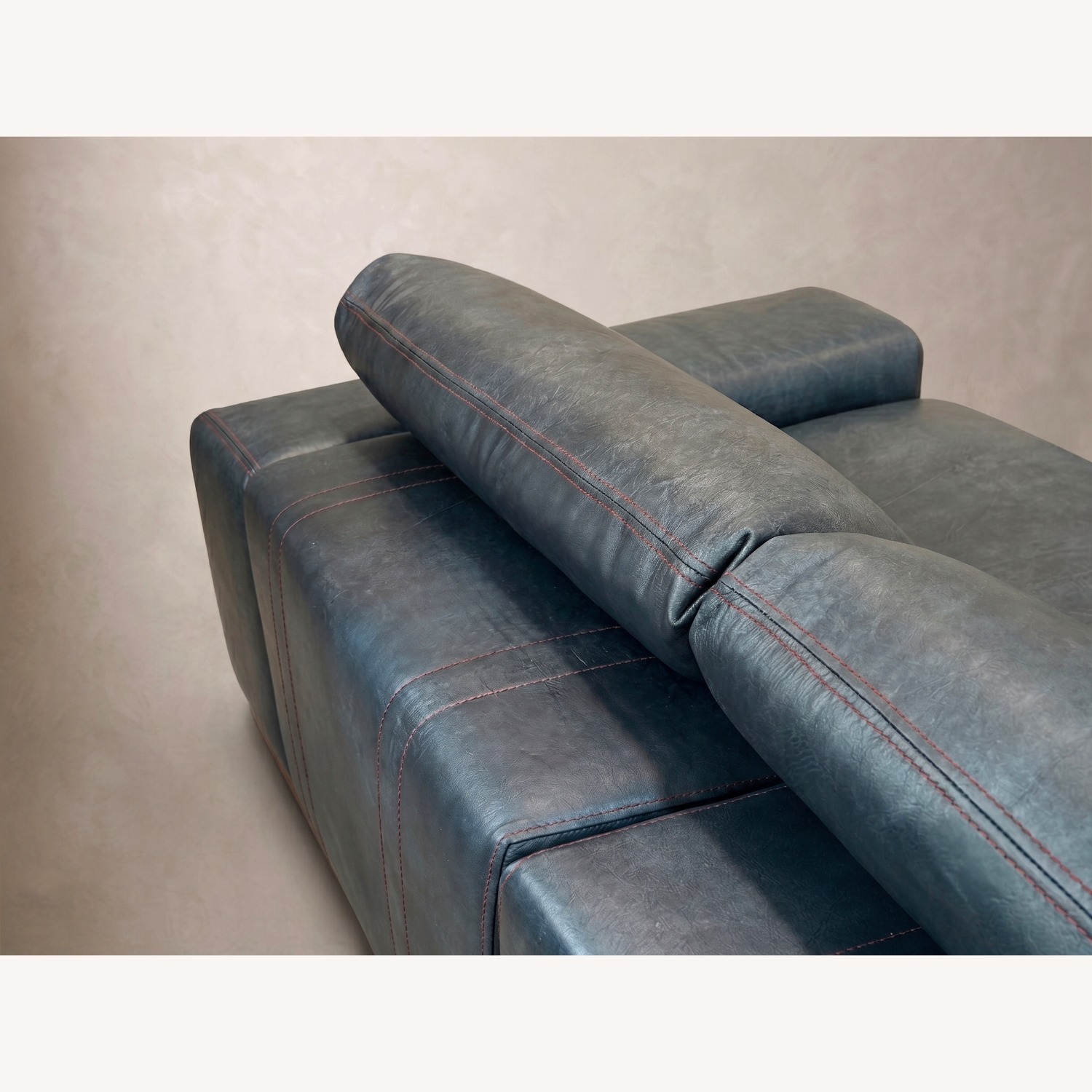 Floating Blue Leather Sofa With Manual Recliner - image-3