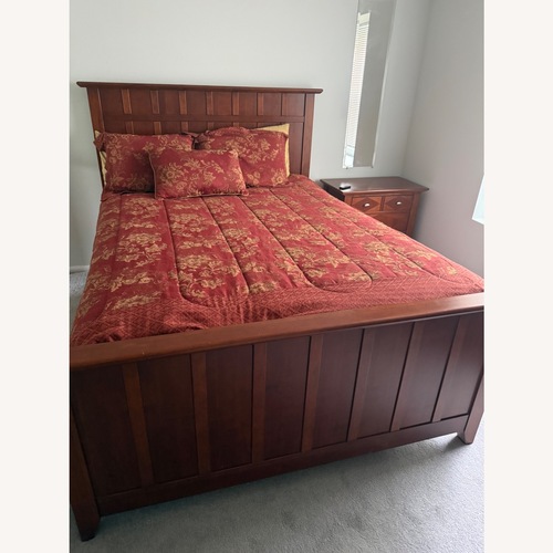 Used Light Brown Wood Queen Bed for sale on AptDeco
