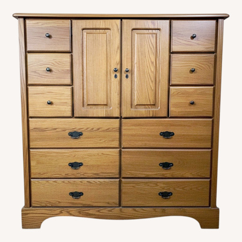Used Medium Brown Wooden Clothing Armoire for sale on AptDeco
