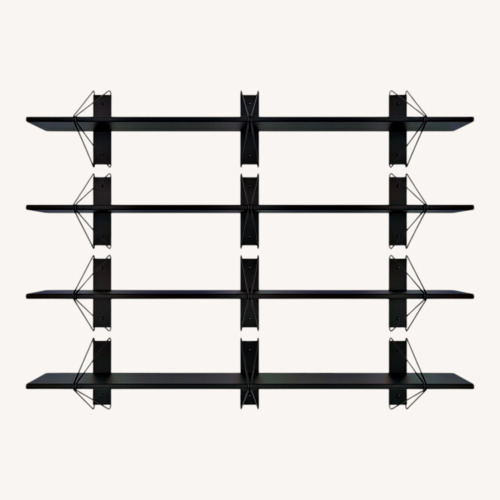 Used A Set of 4 Black Wood Wall Shelves for sale on AptDeco