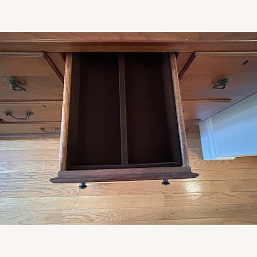 Used Vintage/Antique Finds Dark Brown Wood Dresser for sale on AptDeco
