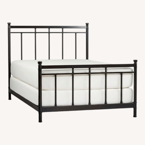 Used Crate & Barrel Black Metal Queen Bed for sale on AptDeco