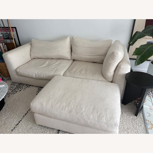 Used EQ3 Cello Natural Linen Loveseat for sale on AptDeco