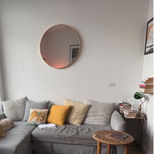 Used Metal Frame Round Wall Mirror for sale on AptDeco