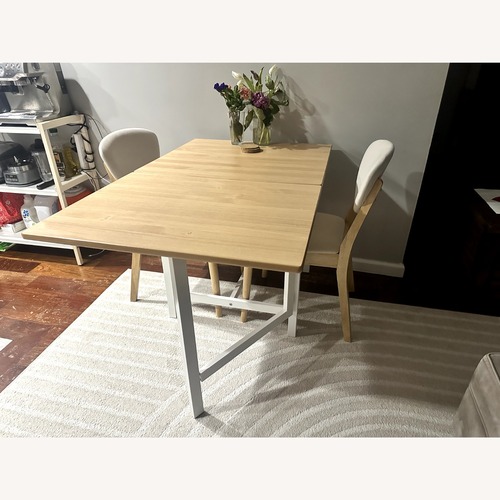 Used IKEA Pinntorp Light Brown Wood Dining Table for sale on AptDeco