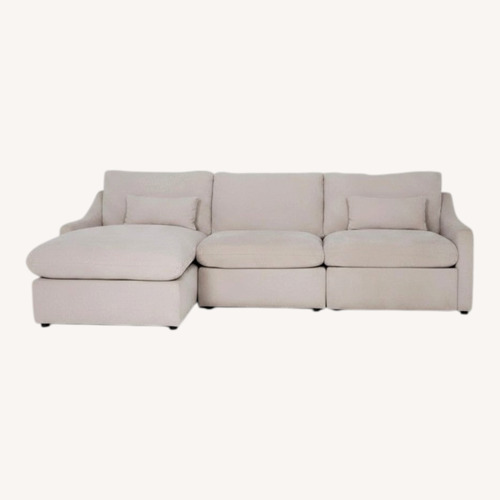 Used Living Spaces Kennedy White Fabric 3+ Piece Sectional for sale on AptDeco