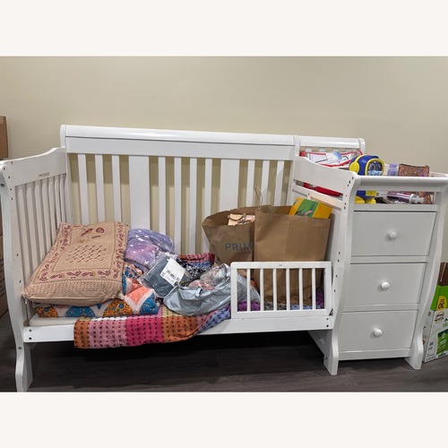 Used White Wood Crib for sale on AptDeco