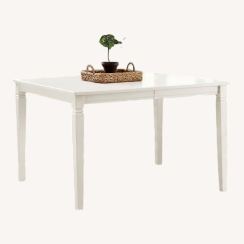 Used Rooms To Go White Dining Table for sale on AptDeco